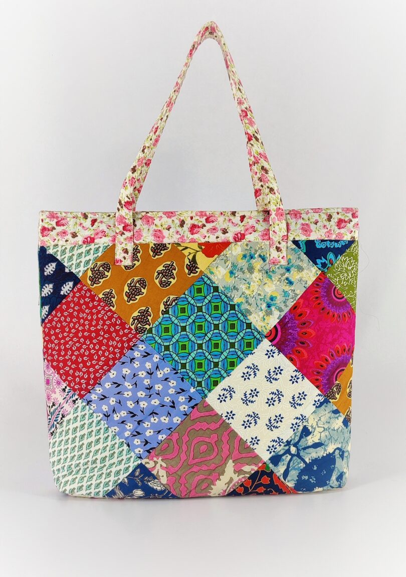 DIAMOND CUT PATCH HAND BAG